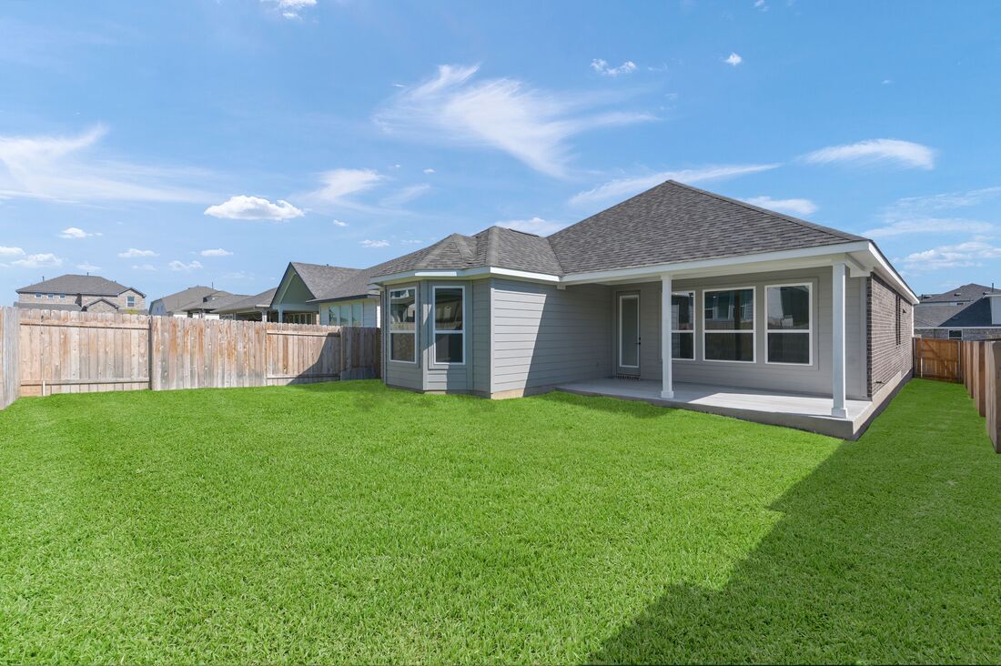 113 Wingstem Way Georgetown, TX 78633 - Photo 17 of 37 a front view of a house with a garden and yard