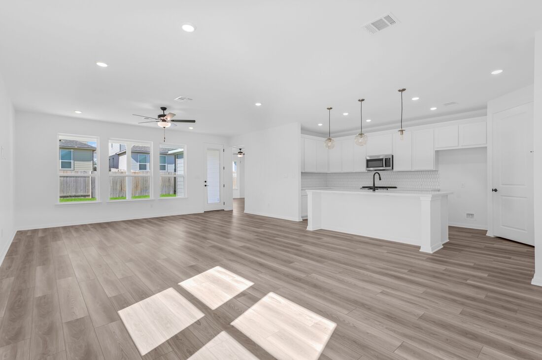113 Wingstem Way Georgetown, TX 78633 - Photo 4 of 37 a view of kitchen with wooden floor