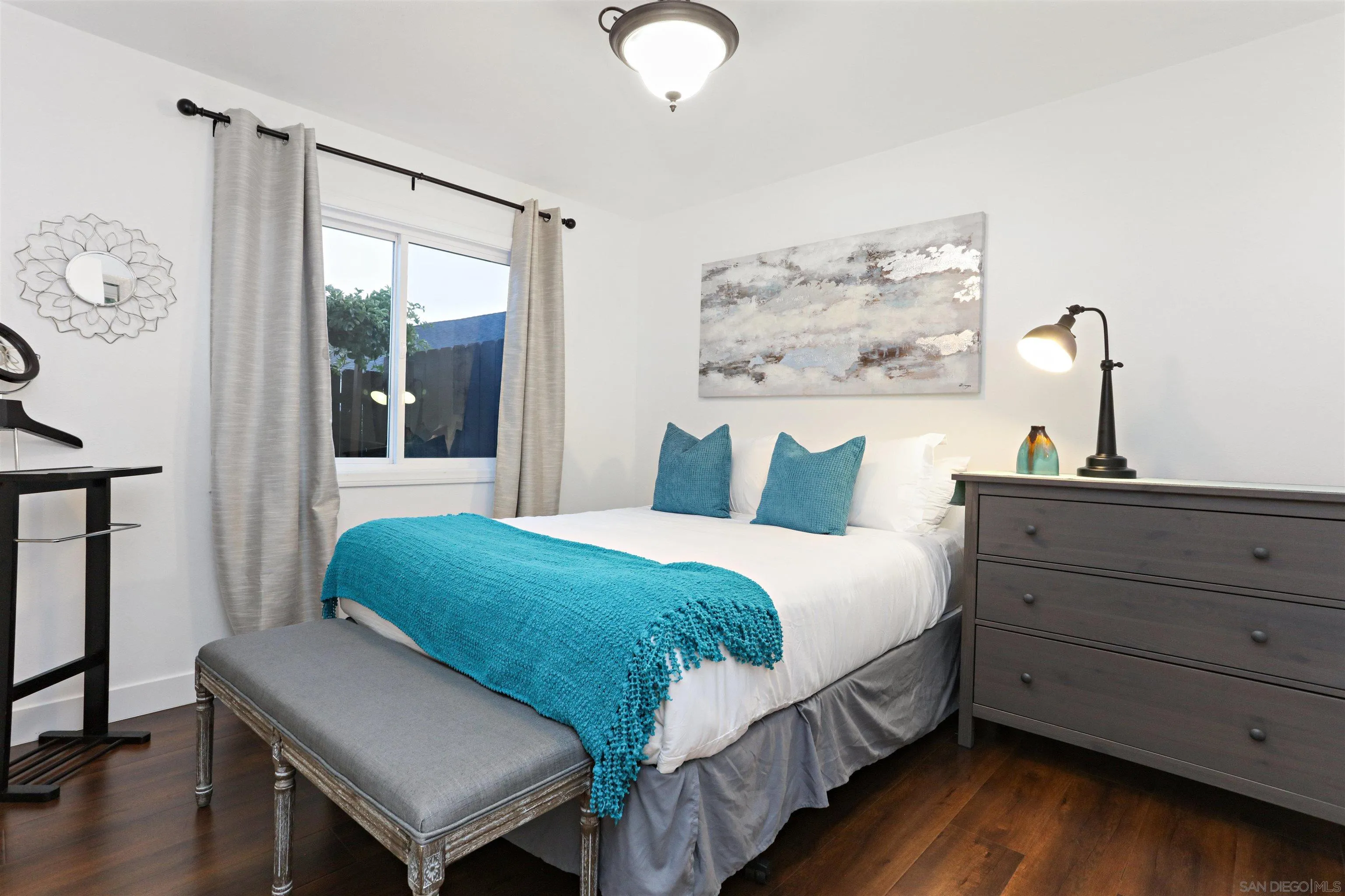 14607 Bowdoin Road Poway, CA 92064 - Photo 14 of 30 a bedroom with a bed and a dresser