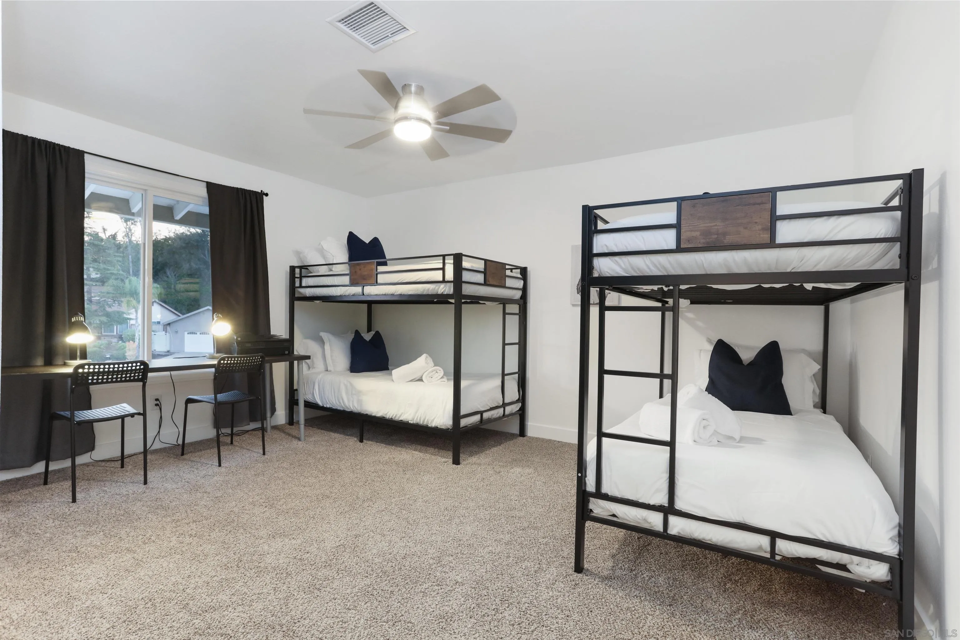 14607 Bowdoin Road Poway, CA 92064 - Photo 19 of 30 a bedroom with a bed and a chandelier