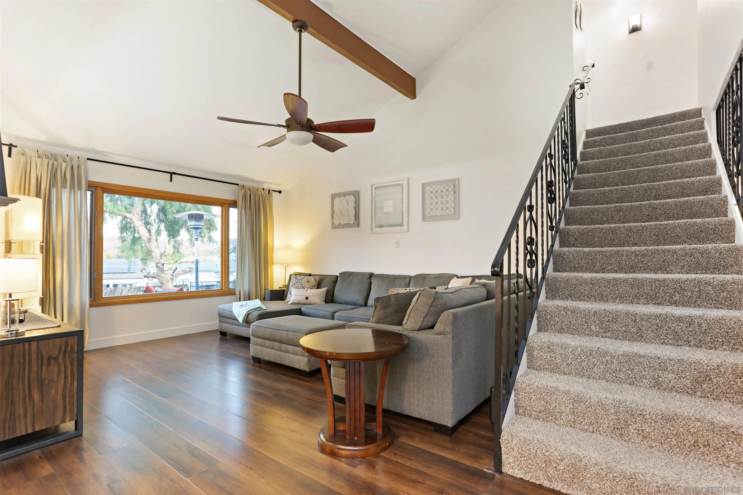 14607 Bowdoin Road Poway, CA 92064 - Photo 3 of 30 a living room with furniture and a large window