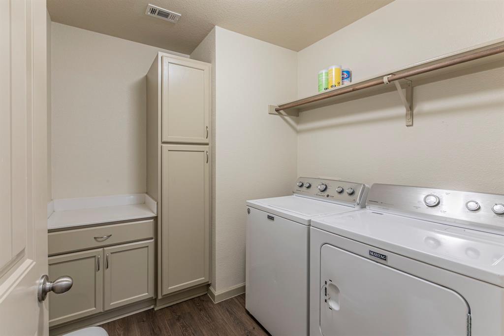 2210 Torch Lake Drive Forney, TX 75126 - Photo 21 of 29 a utility room with dryer and washer