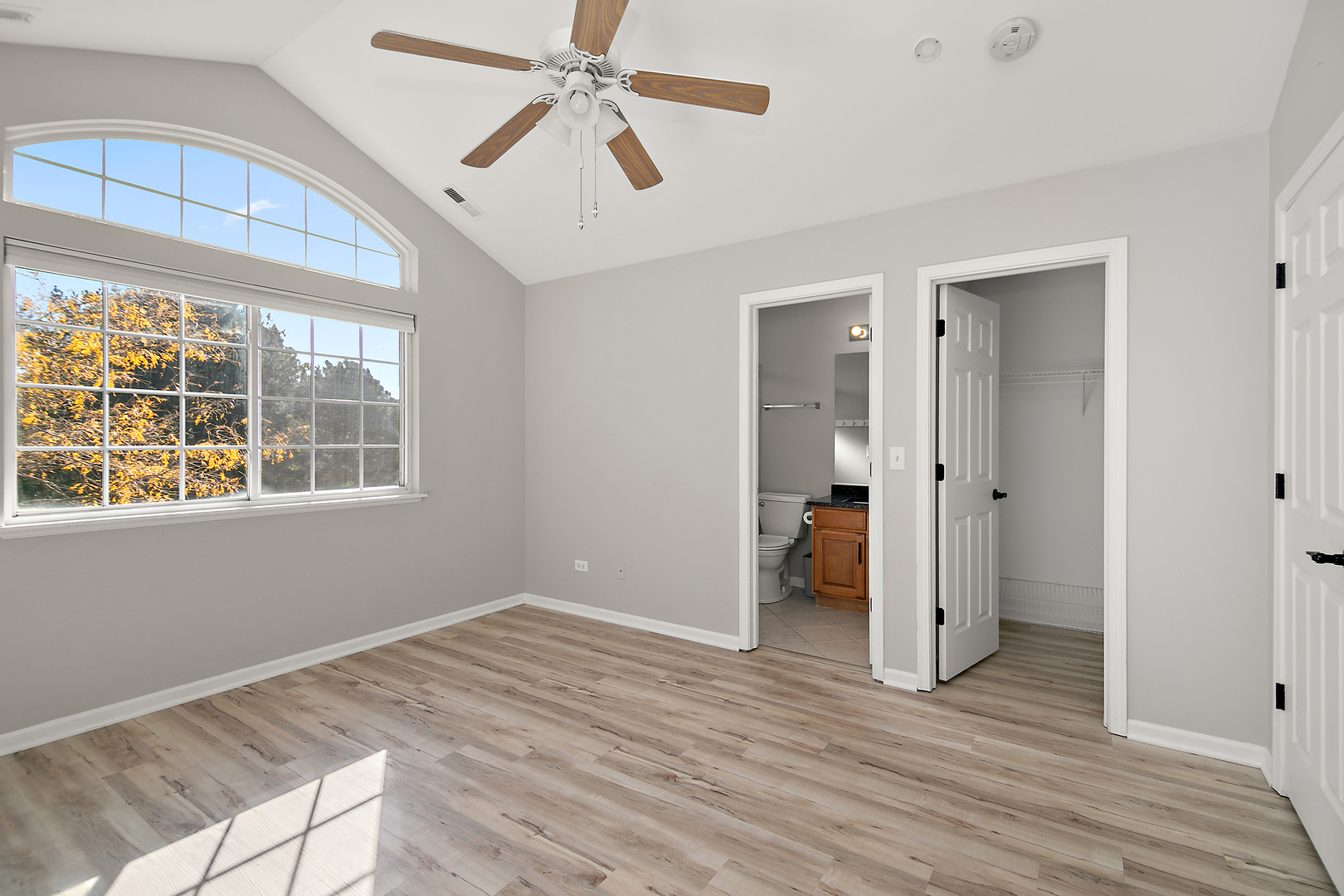 17694 Gilbert Drive Lockport, IL 60441 - Photo 20 of 29 a view of empty room with wooden floor and fan