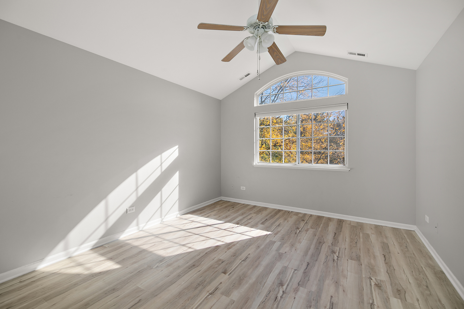 17694 Gilbert Drive Lockport, IL 60441 - Photo 21 of 29 wooden floor in an empty room with a window