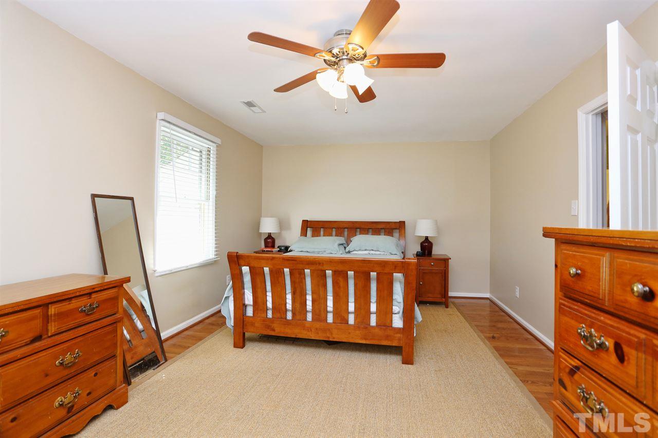 2860 Wycliff Road Raleigh, NC 27607 - Photo 11 of 25 a bedroom with a bed and a window