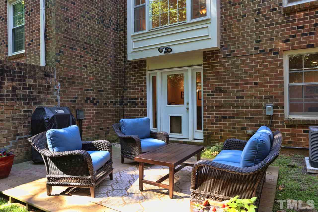 2860 Wycliff Road Raleigh, NC 27607 - Photo 23 of 25 a view of a patio with couple of chairs
