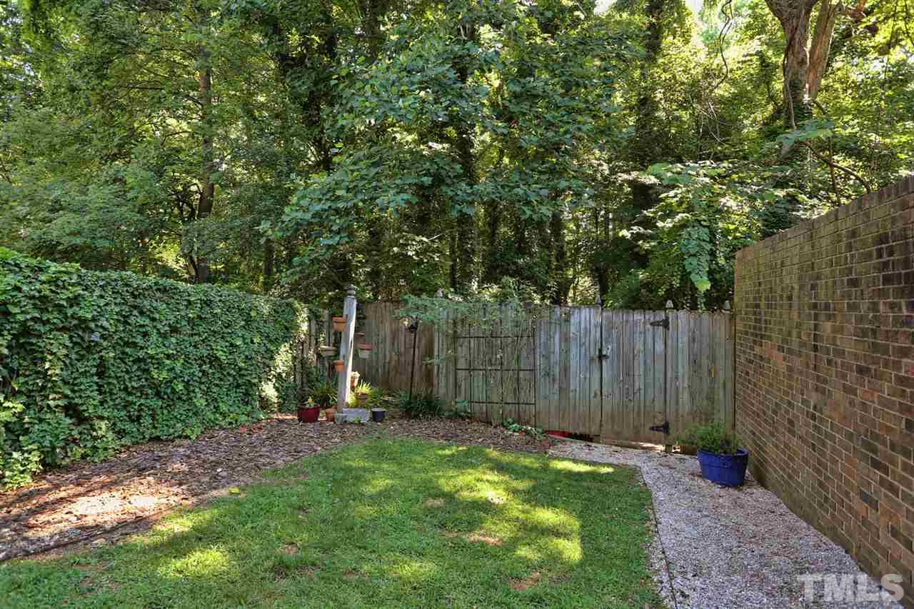 2860 Wycliff Road Raleigh, NC 27607 - Photo 25 of 25 a view of backyard with tree