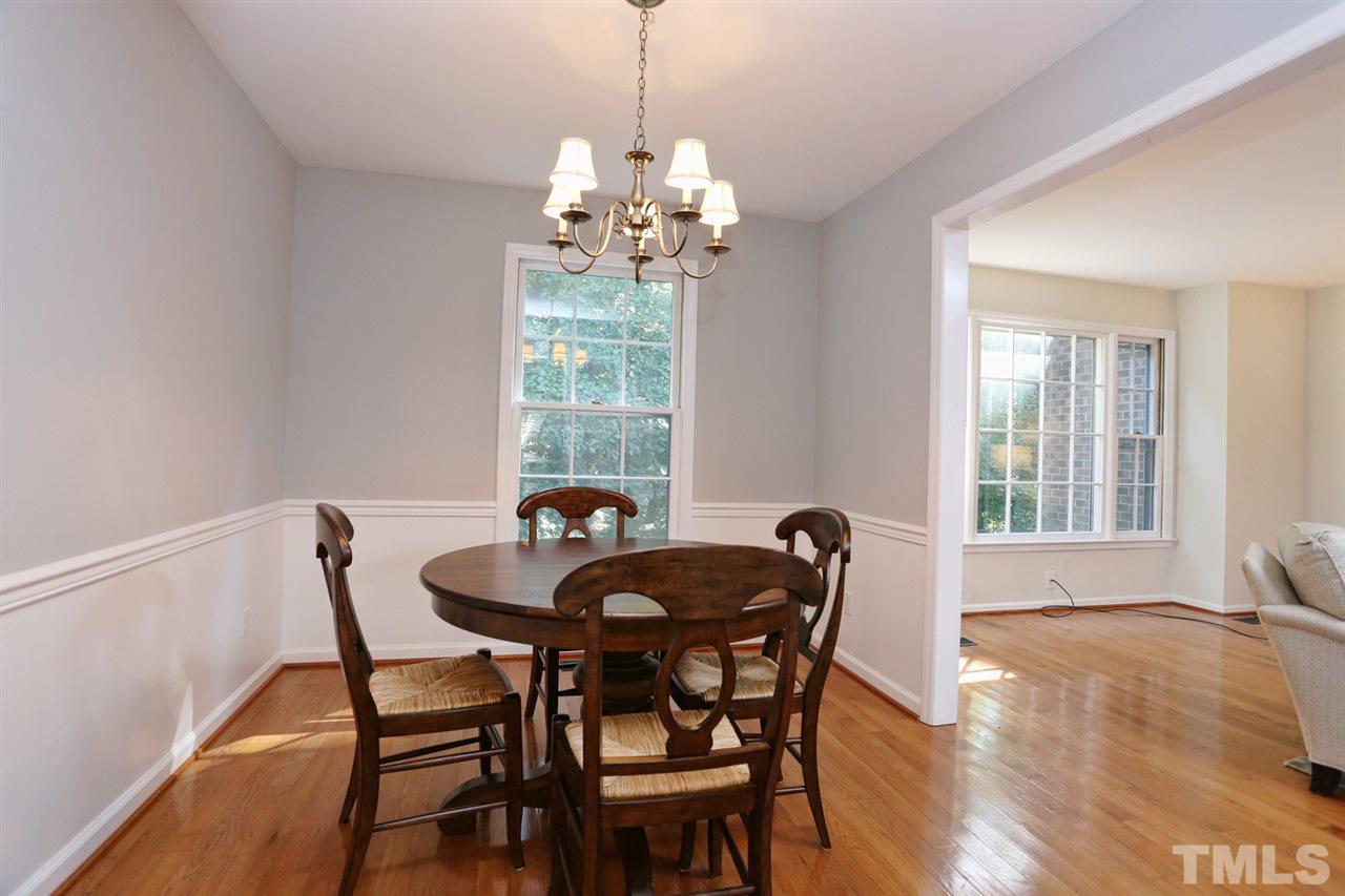 2860 Wycliff Road Raleigh, NC 27607 - Photo 5 of 25 a view of a dining room with furniture and window