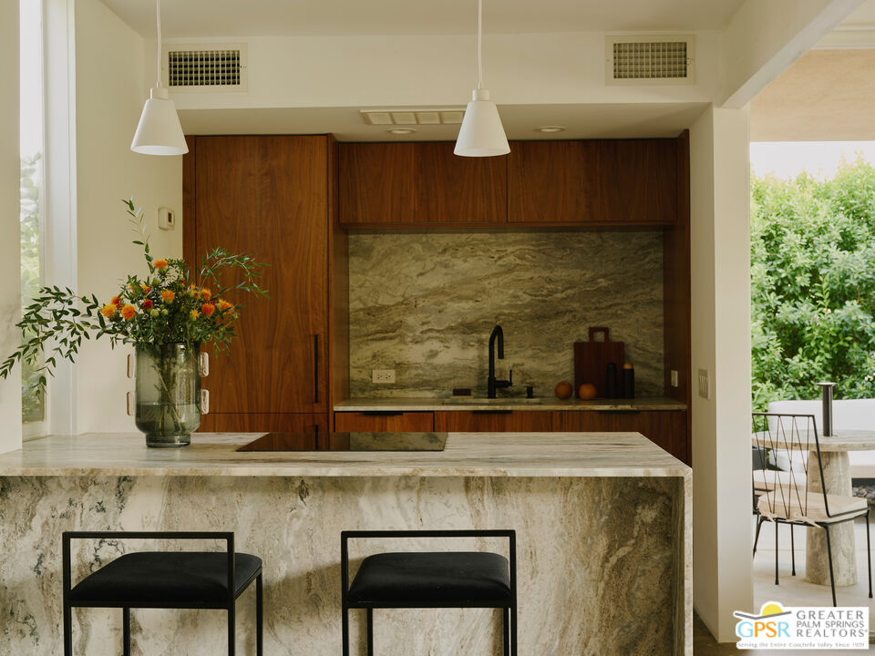 360 Cabrillo Road, Unit 101 Palm Springs, CA 92262 - Photo 13 of 39 a bathroom with a sink and a mirror