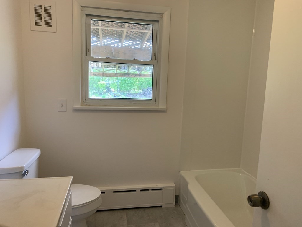 3 Sasur Street Three Rivers, MA 01080 - Photo 12 of 35 a bathroom with a toilet and a tub