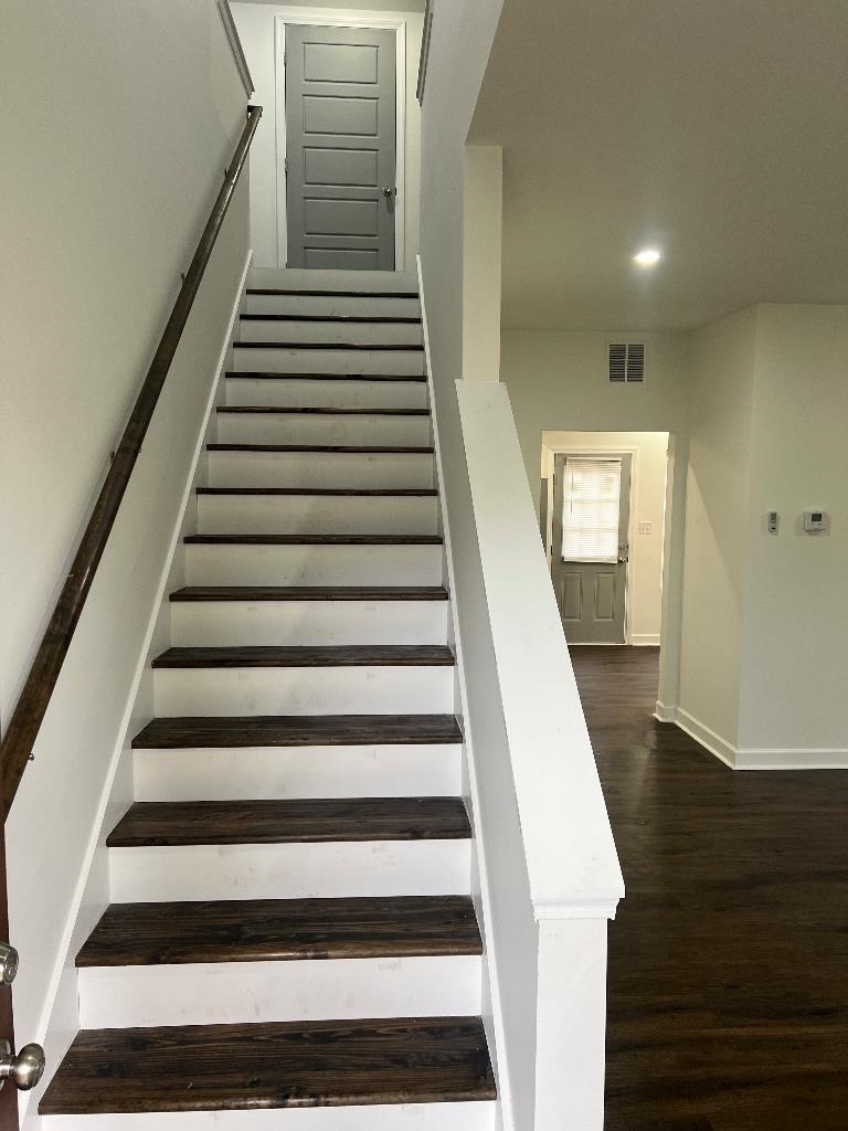56 South Sanga Road Cordova, TN 38018 - Photo 19 of 26 Staircase featuring wood finished floors and recessed lighting