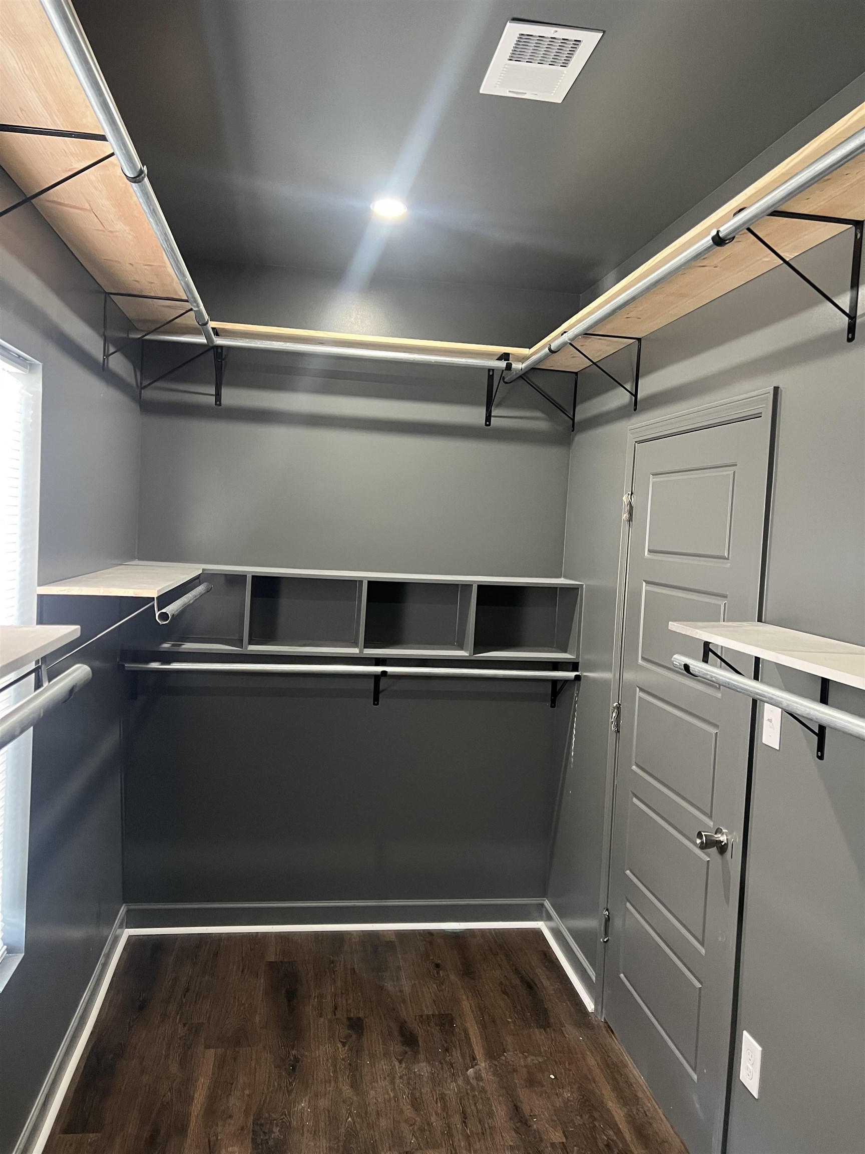 56 South Sanga Road Cordova, TN 38018 - Photo 8 of 26 Walk in closet with dark wood finished floors