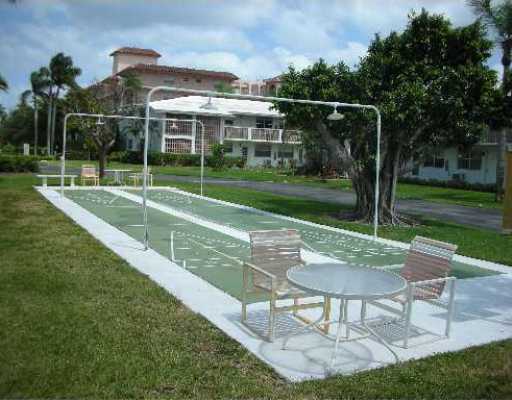 10 Southeast 13th Street, Unit D1 Boca Raton, FL 33432 - Photo 20 of 21 ENJOY THE SHUFFLEBOARD