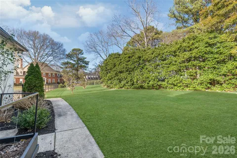 a view of a garden with a fountain
