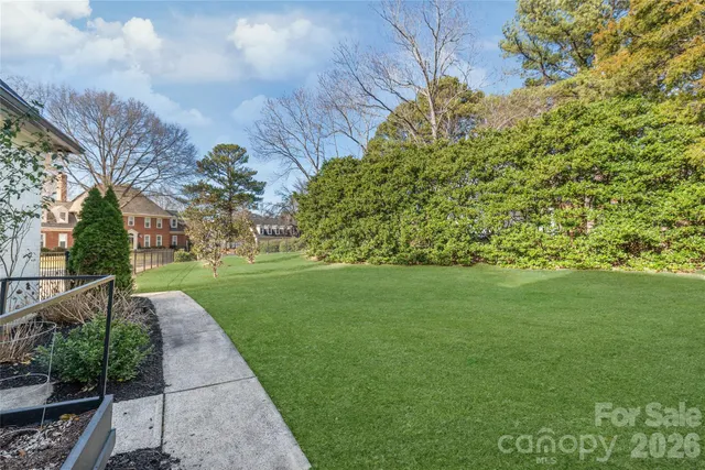 a view of a garden with a fountain