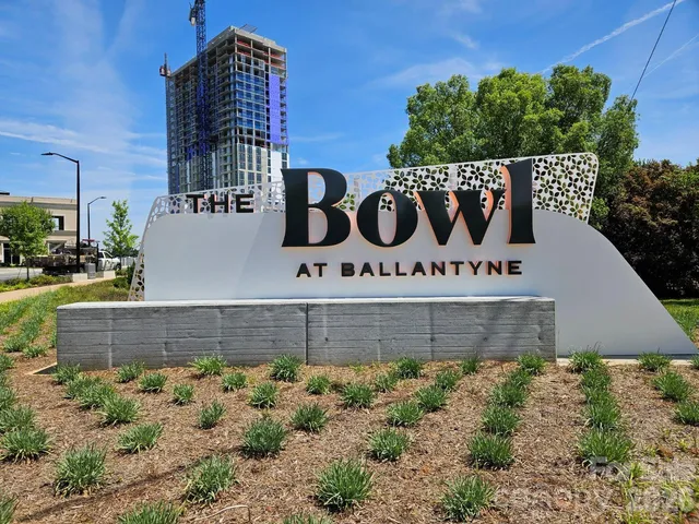a view of a cafe with sitting area