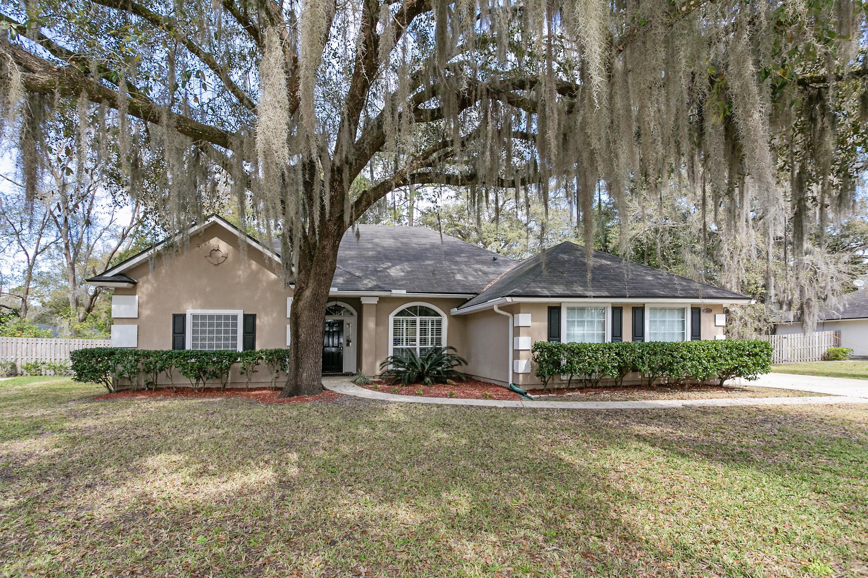 2809 Hidden Stagecoach Road Jacksonville, FL 32223 - Photo 1 of 25 front view of house with a yard
