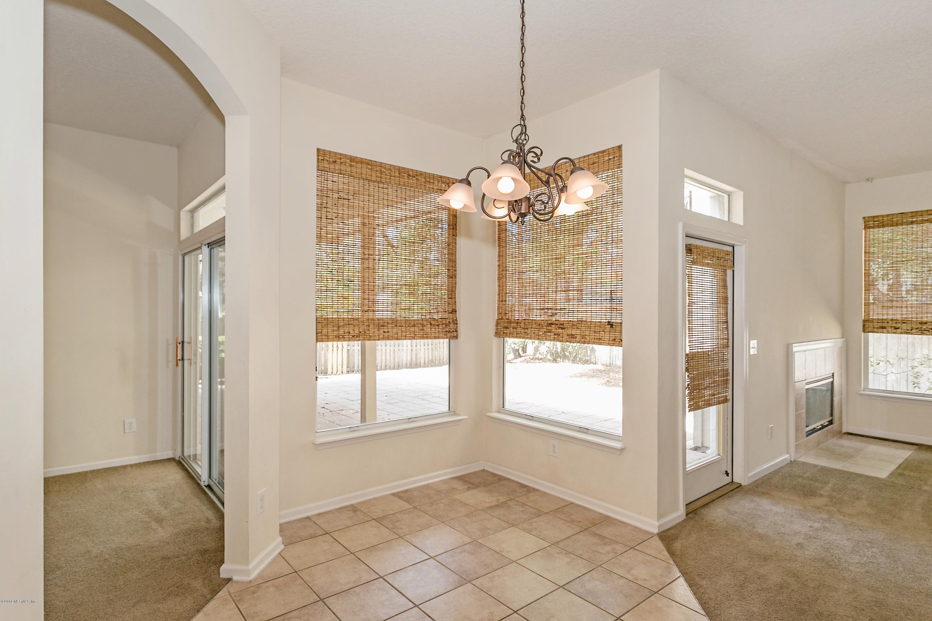 2809 Hidden Stagecoach Road Jacksonville, FL 32223 - Photo 7 of 25 a view of an empty room with window