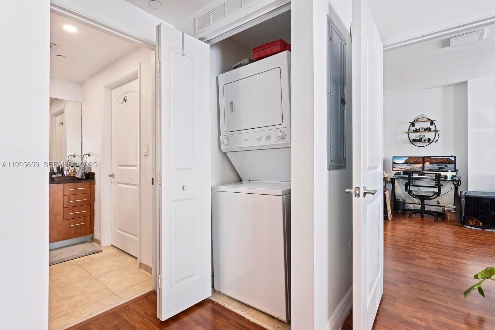 7350 Southwest 89th Street, Unit 607S Miami, FL 33156 - Photo 12 of 19 a view of kitchen with furniture and wooden floor