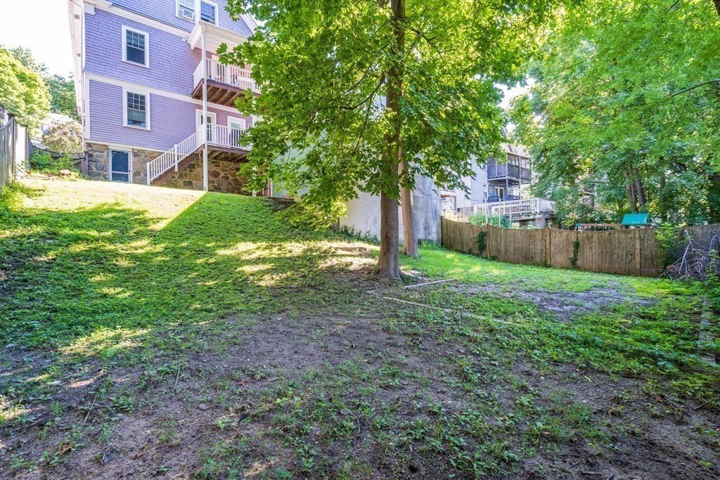 106 Westbourne Terrace, Unit 1 Brookline, MA 02446 - Photo 19 of 22 a view of a house with a yard