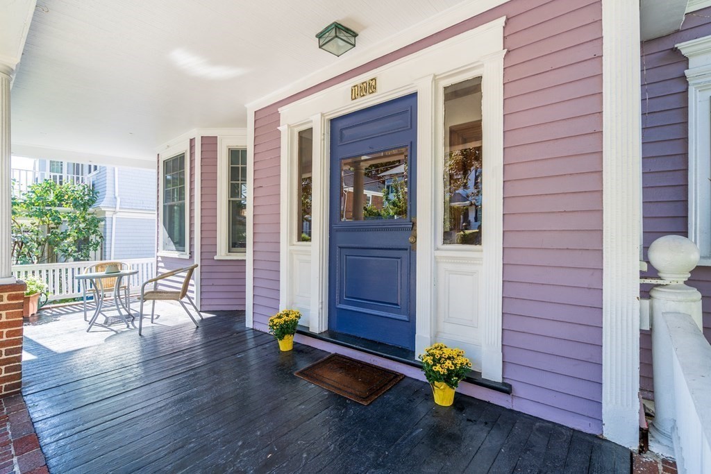 106 Westbourne Terrace, Unit 1 Brookline, MA 02446 - Photo 2 of 22 a front view of a house with outdoor seating