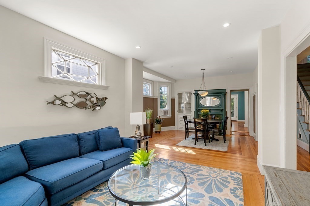 106 Westbourne Terrace, Unit 1 Brookline, MA 02446 - Photo 8 of 22 a living room with furniture and a dining room