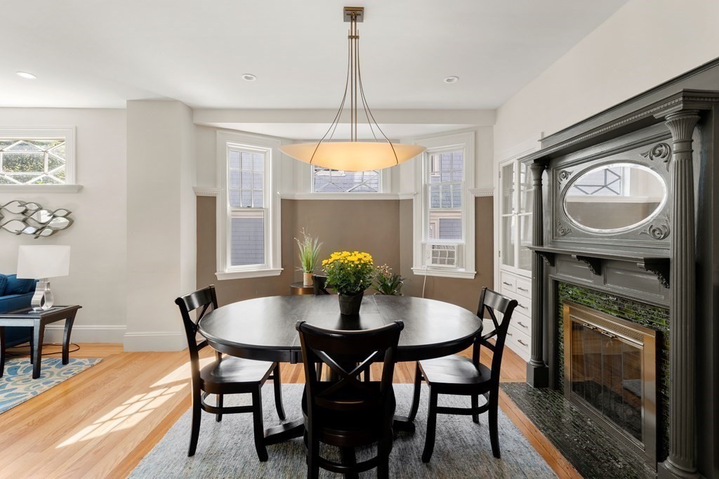 106 Westbourne Terrace, Unit 1 Brookline, MA 02446 - Photo 10 of 22 a dining room with furniture and window