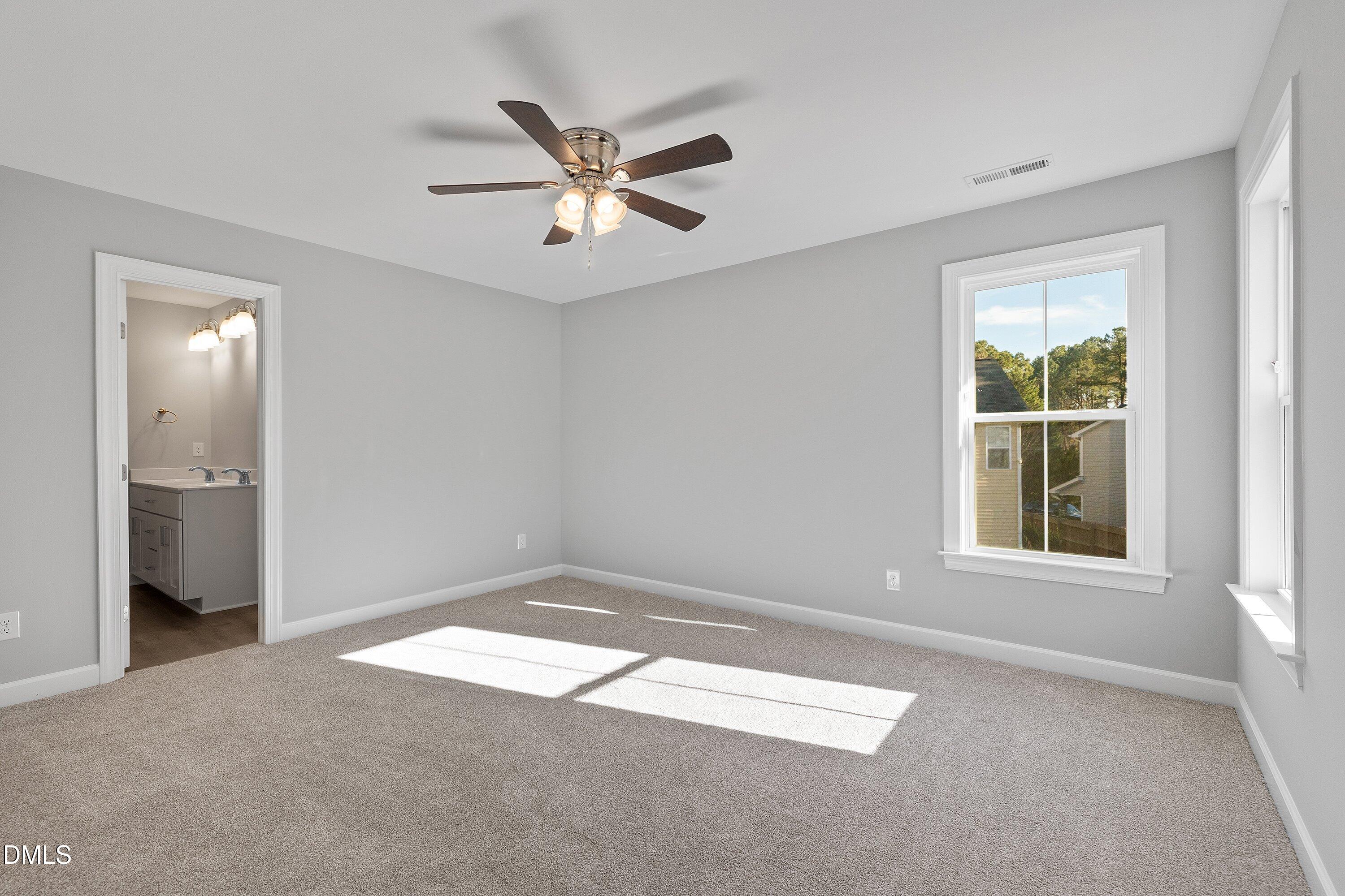 1808 Falls Landing Drive Raleigh, NC 27614 - Photo 13 of 23 a view of an empty room with a window