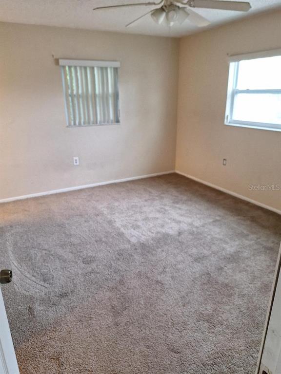 8253 Saybrook Drive Port Richey, FL 34668 - Photo 9 of 21 MASTER BEDROOM