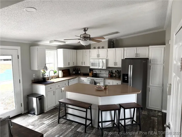 a view of a livingroom with furniture