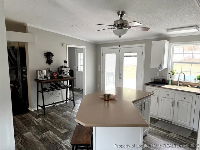 a view of a storage and utility room in a kitchen