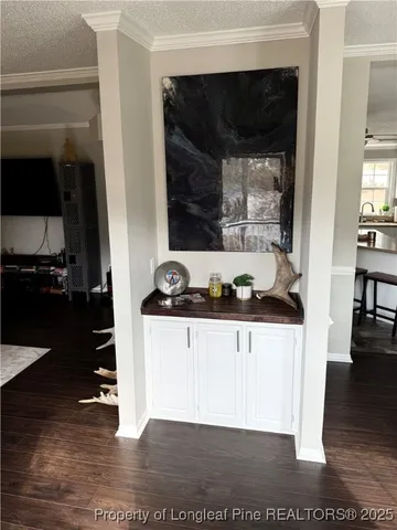 a kitchen with stainless steel appliances a stove and a microwave