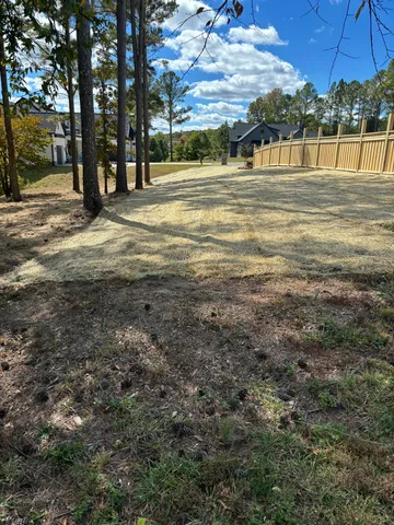 a view of road with trees
