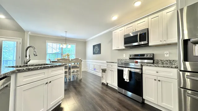 a bedroom with a bed and furniture