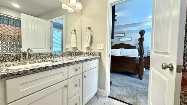 a bathroom with a toilet and a sink