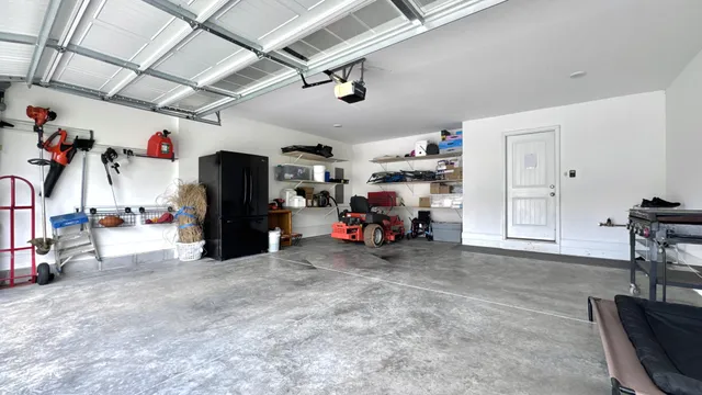 a view of a garage with parked cars
