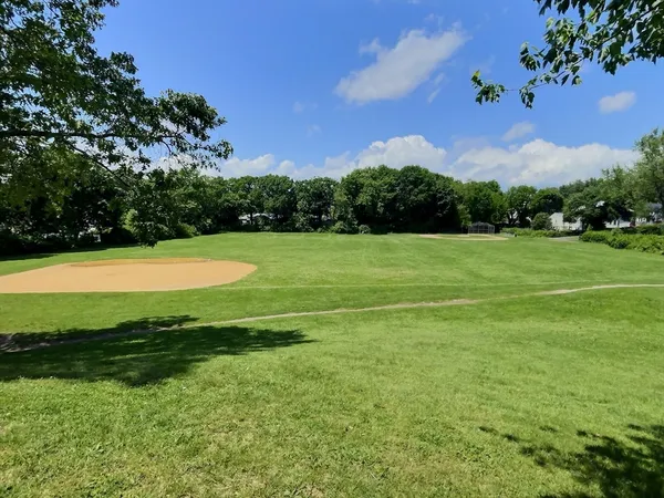 a view of a golf course with a lake