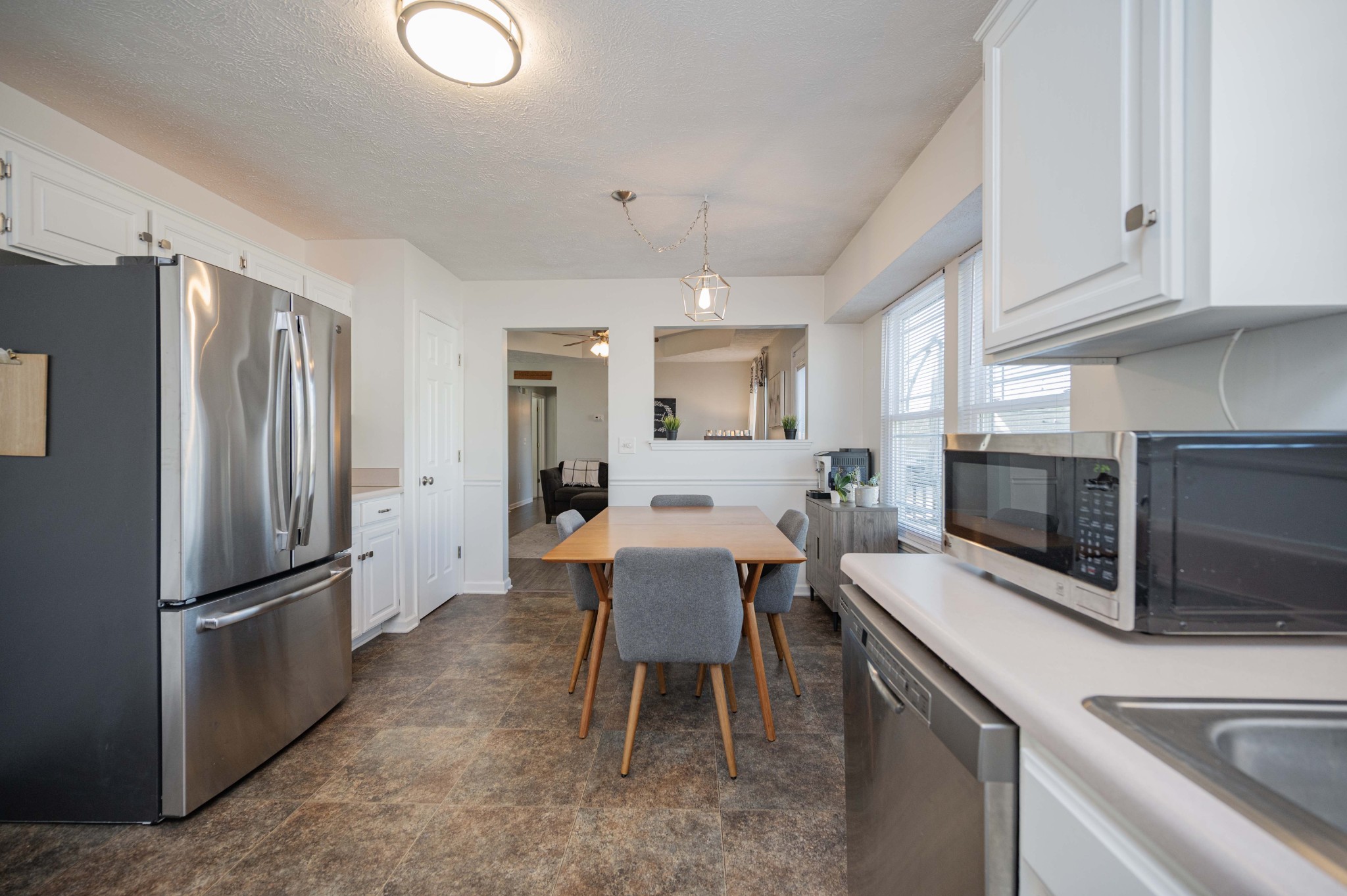 642 Rock Springs Road Smyrna, TN 37167 - Photo 16 of 49 a kitchen with a sink stainless steel appliances and cabinets