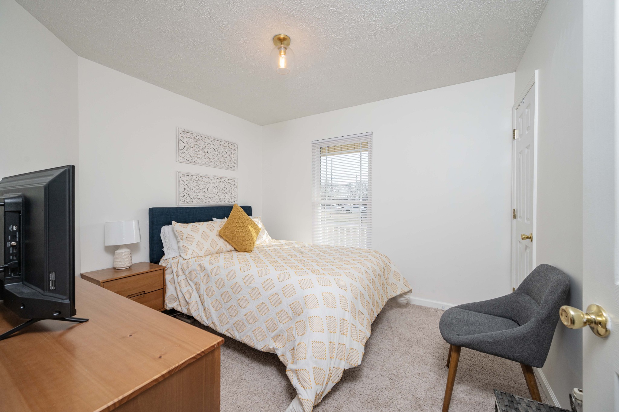 642 Rock Springs Road Smyrna, TN 37167 - Photo 35 of 49 a bedroom with a bed and a tv