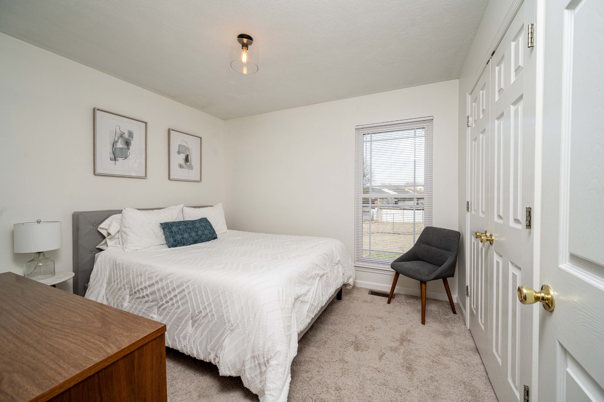 642 Rock Springs Road Smyrna, TN 37167 - Photo 39 of 49 a bedroom with a bed and a window