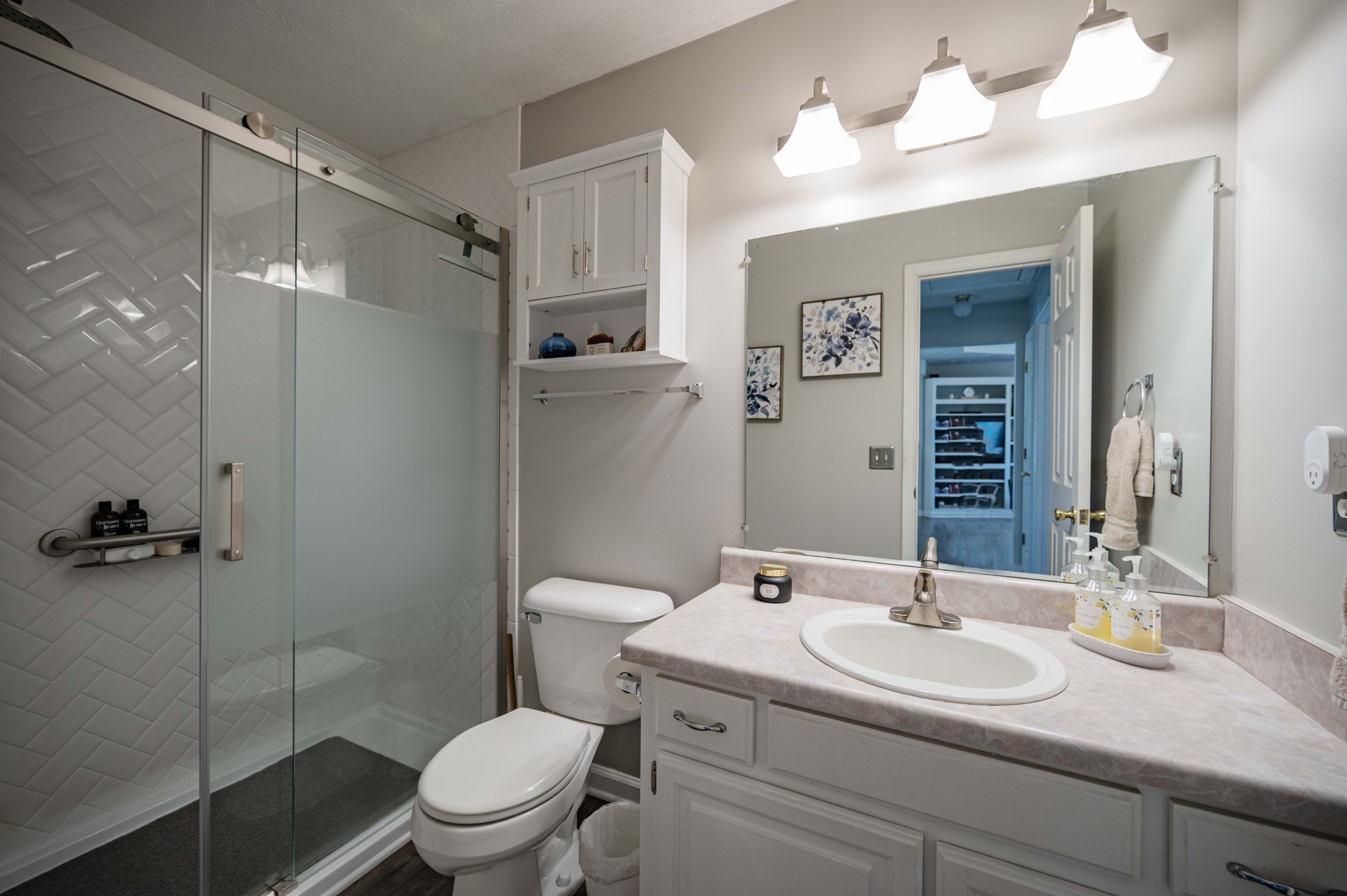 642 Rock Springs Road Smyrna, TN 37167 - Photo 41 of 49 a bathroom with a sink toilet vanity and shower