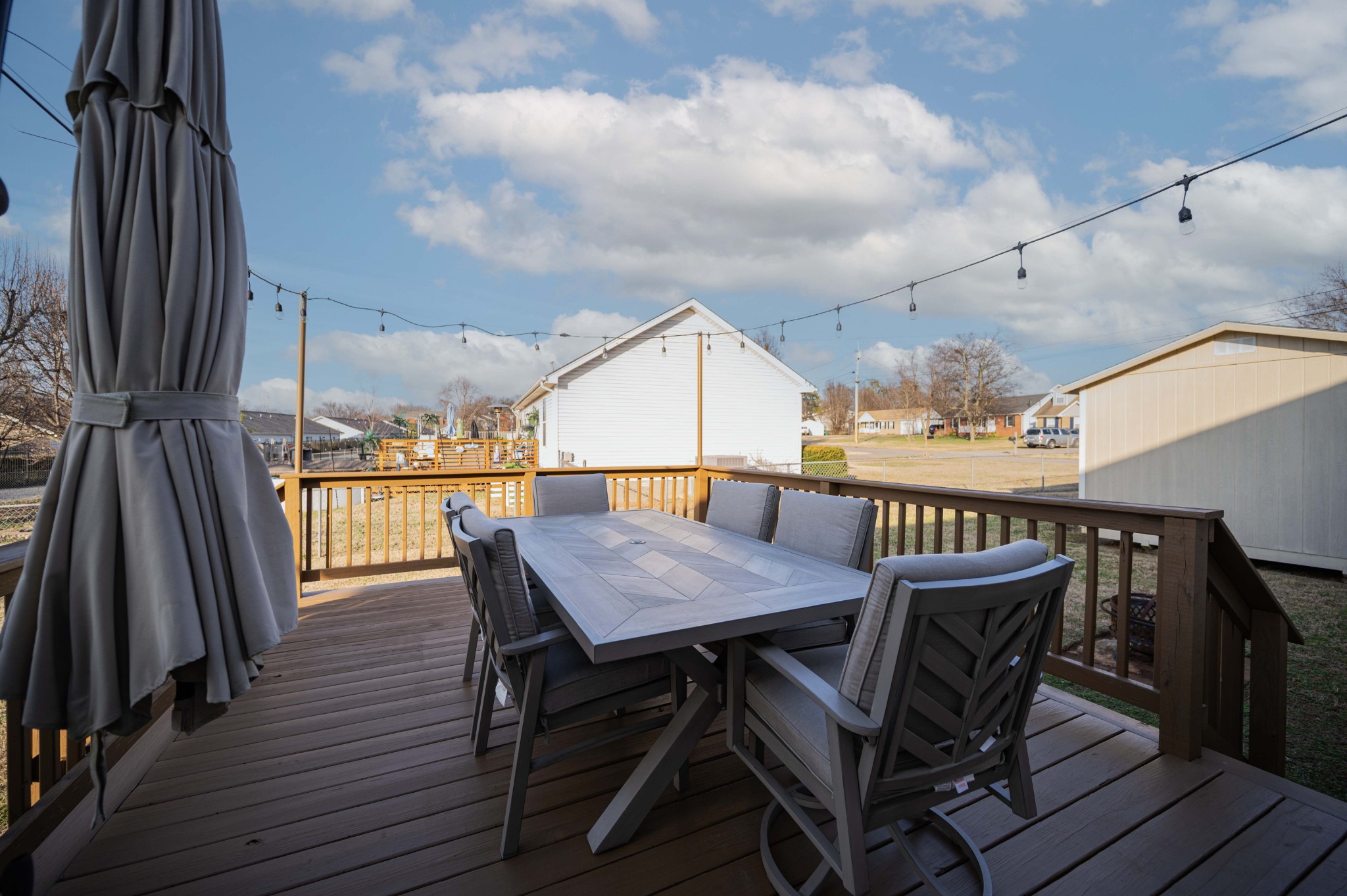 642 Rock Springs Road Smyrna, TN 37167 - Photo 42 of 49 a view of a roof deck with table and chairs