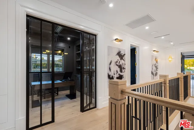 a bathroom with a sink a washer and dryer