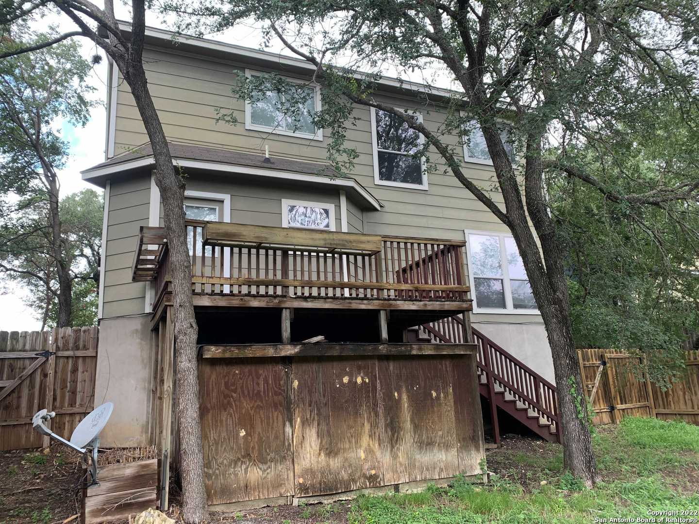 522 Cattle Ranch Drive San Antonio, TX 78245 - Photo 20 of 24 a view of a house with a deck