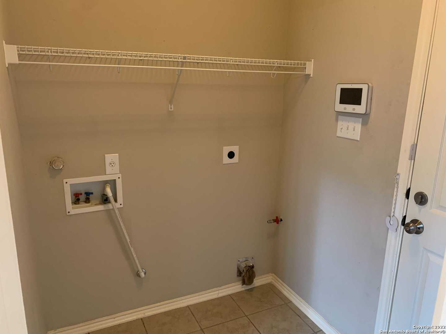 522 Cattle Ranch Drive San Antonio, TX 78245 - Photo 8 of 24 a bathroom with a shower