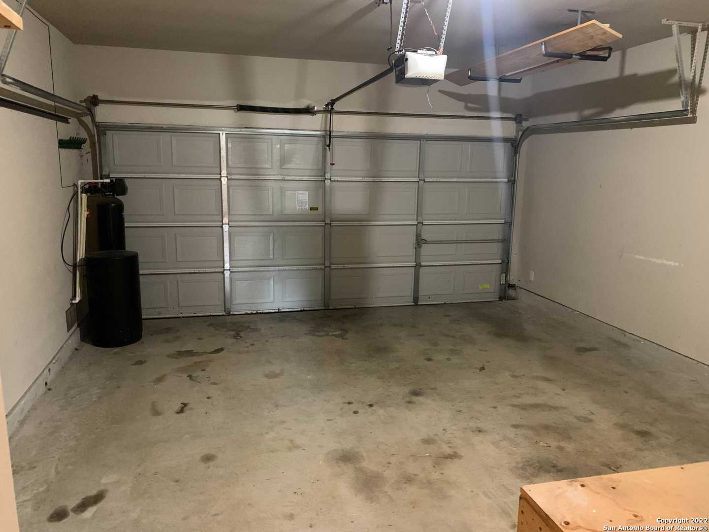 522 Cattle Ranch Drive San Antonio, TX 78245 - Photo 9 of 24 a view of a room with racks on the wall