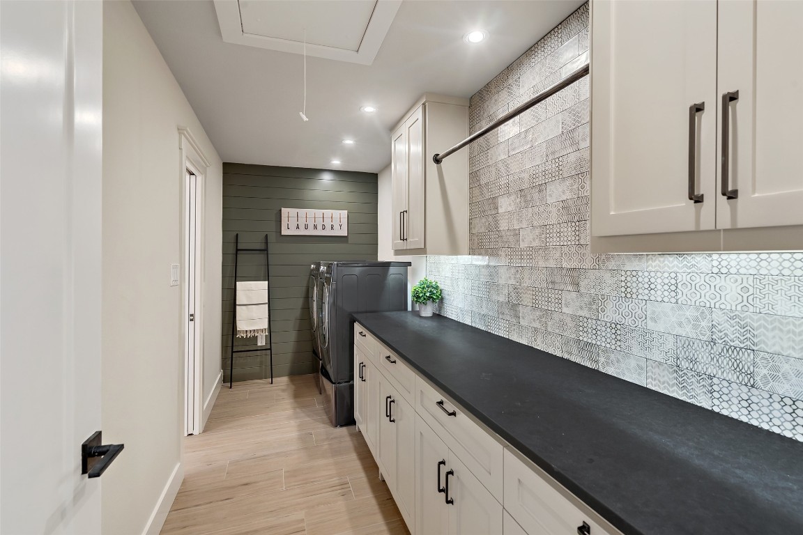 13824 Lone Rider Trail Austin, TX 78738 - Photo 20 of 40 a spacious bathroom with a granite countertop sink