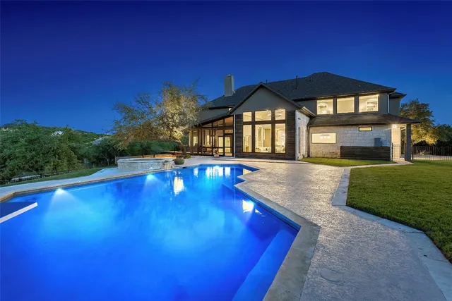 a view of a house with a swimming pool