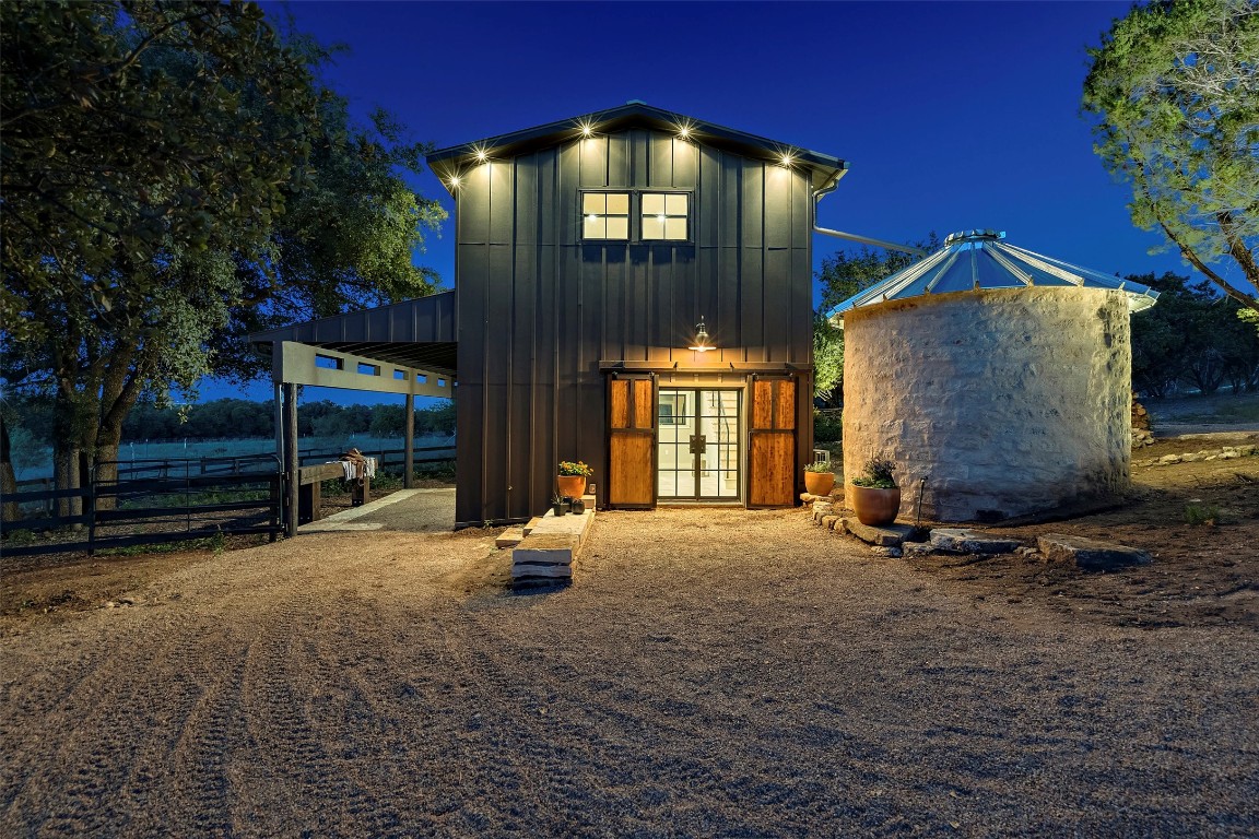 13824 Lone Rider Trail Austin, TX 78738 - Photo 28 of 40 a view of an house with backyard space and porch