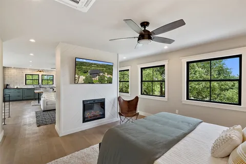 a bedroom with a bed and window